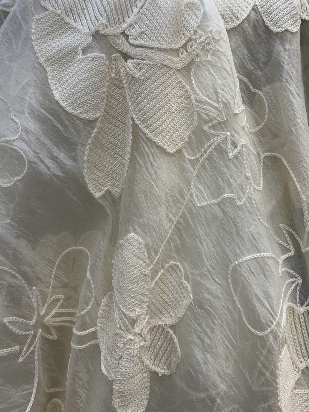 Fine-Plissé Nylon-Polyester Crepe with Floral Embroidery fabric view 1